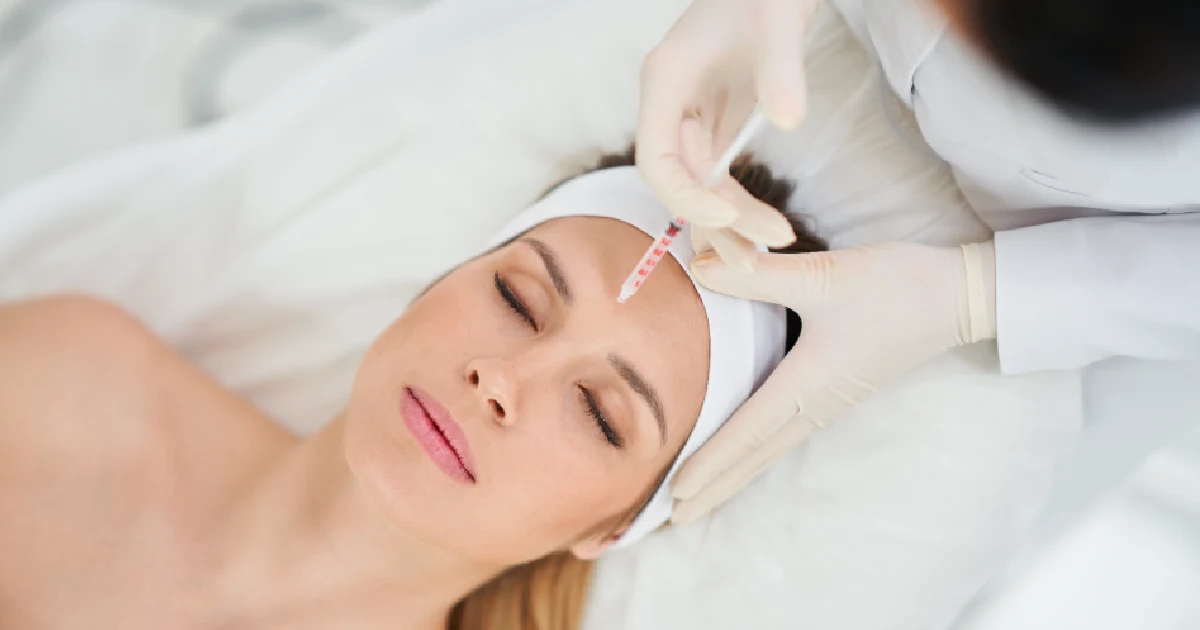 woman receiving a cosmetic Sculptra injection in Centennial, CO